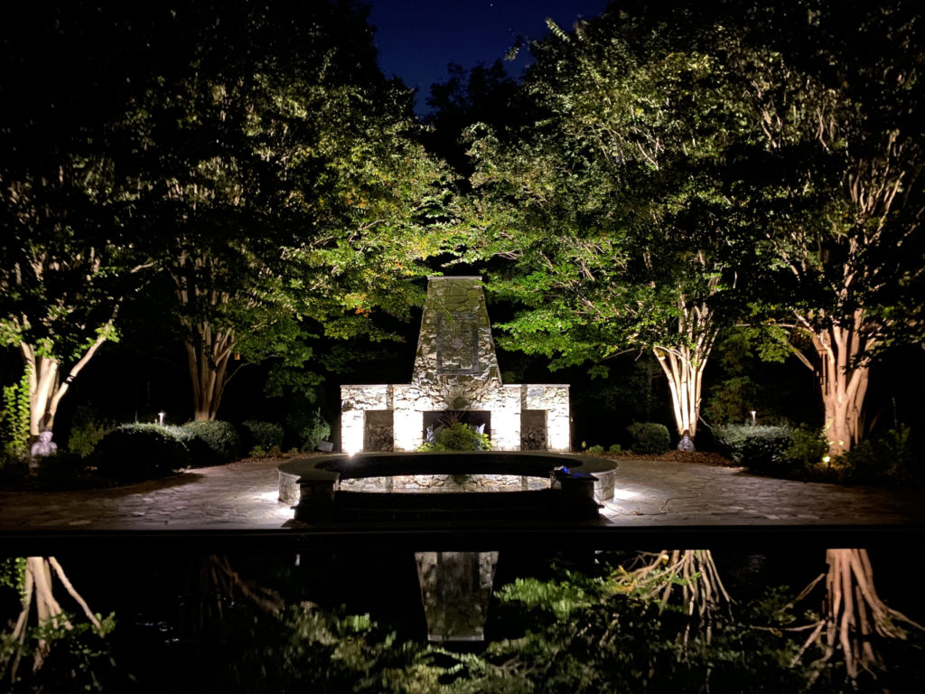 Lit centerpiece on pond