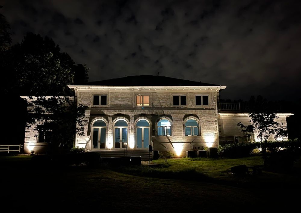 Rear view of illuminated estate at night